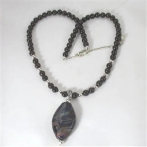 Garnet Gemstone Necklace with Black Swirled Artisan Bead Pendant