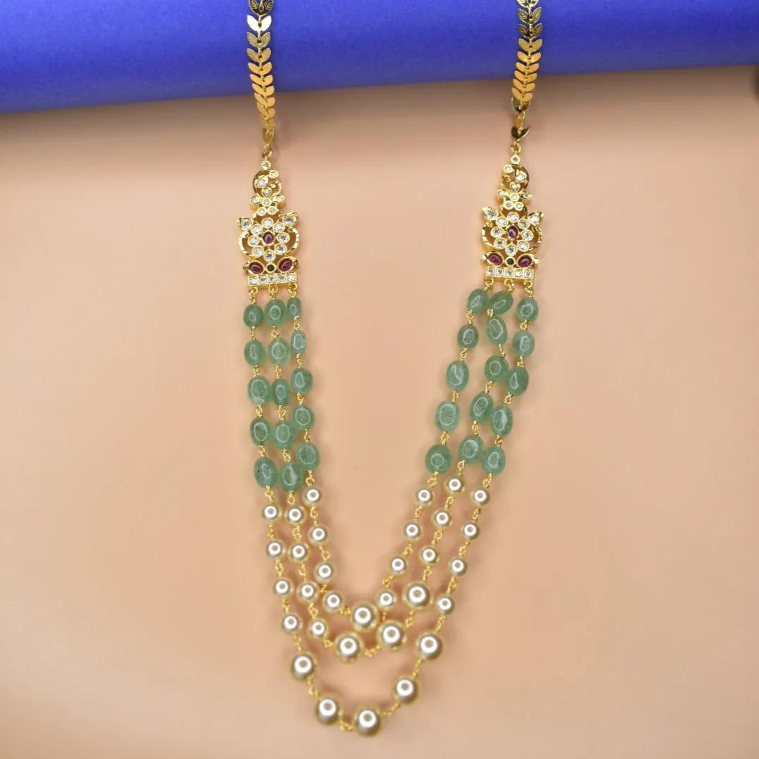 "Dazzle in Style: Three-Layered Pearls & Emerald Chain with Chic Side Brooches"