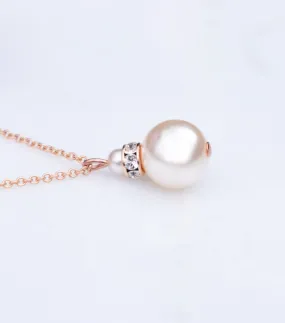 Rose Gold Crystal And Pearl Pendant Necklace