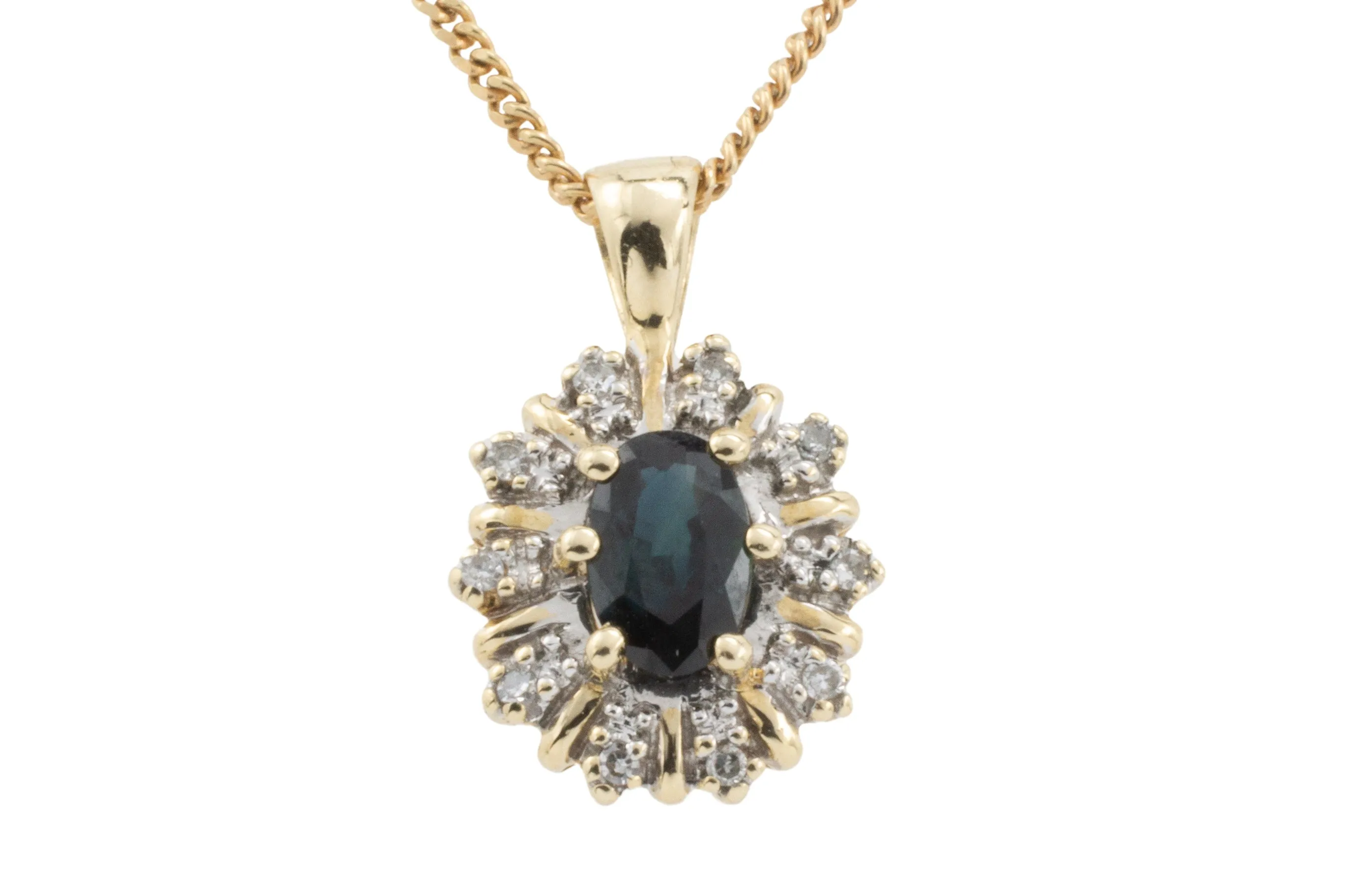 Sapphire and diamond pendant in 14 carat gold