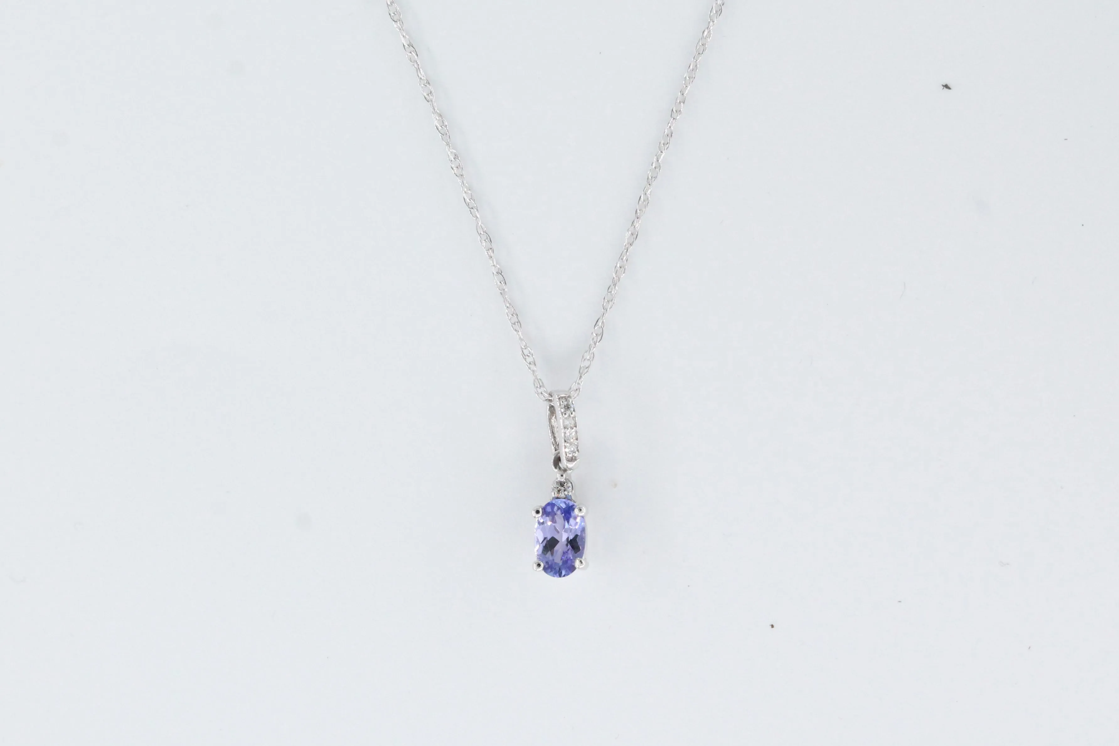 While Gold Tanzanite and Diamond Drop Necklace